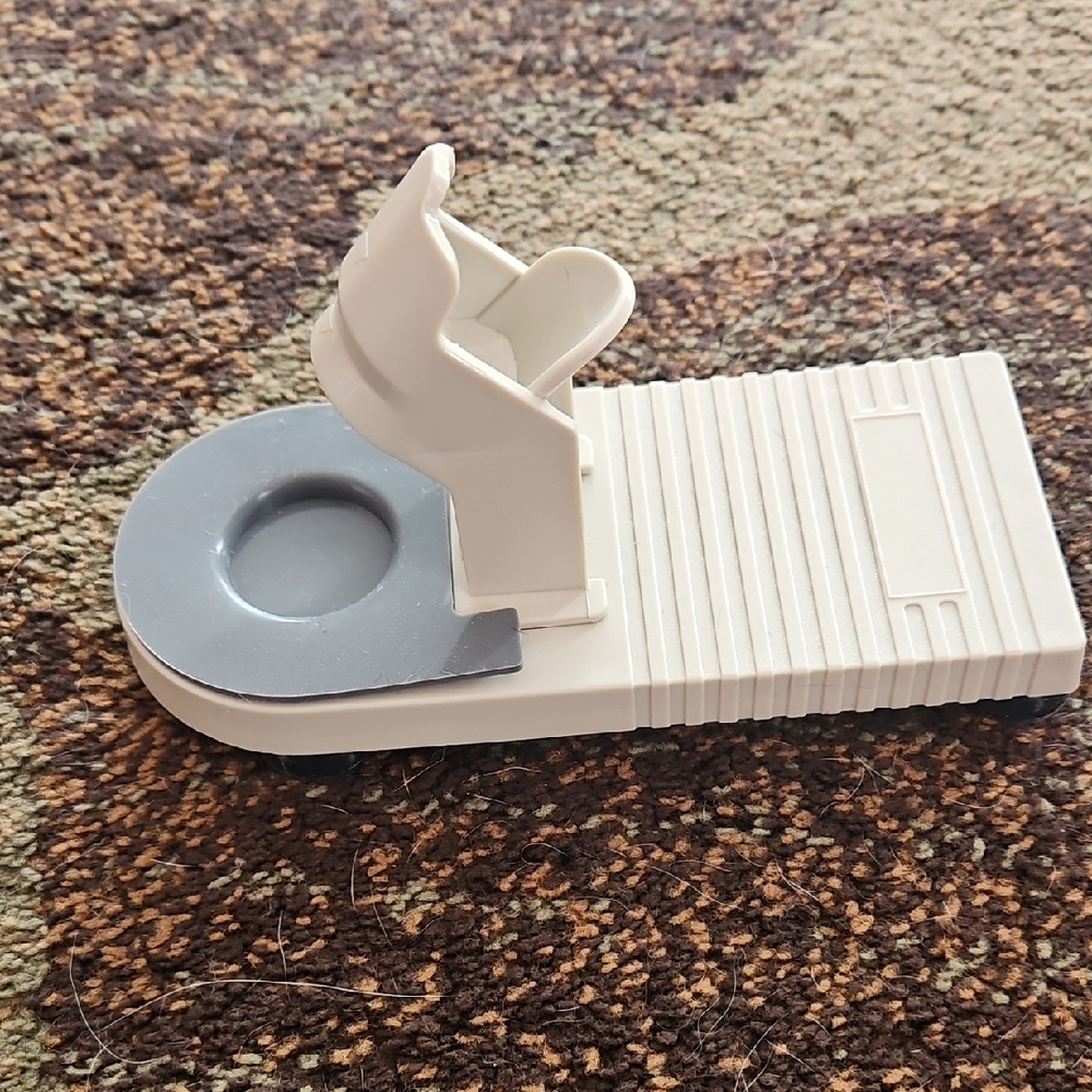 Gray and White Plastic Holder